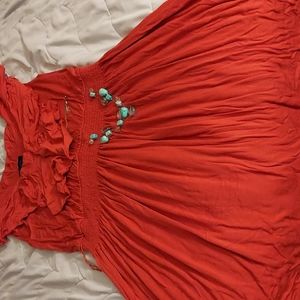 Woman nice shirt size Large color burnt orange with a nice necklace